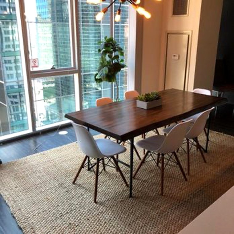 Cleaned open living room in a wood-panelled home